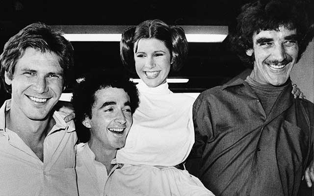 Elenco de Star Wars formado por Harrison Ford (Han Solo); Anthony Daniels (C3PO), Carrie Fisher (Leia) y Peter Mayhew (Chewbacca)